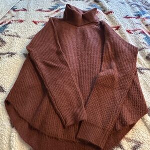 Kuhl cinnamon  Turtleneck Sweater
worn once. Like new. Very warm.